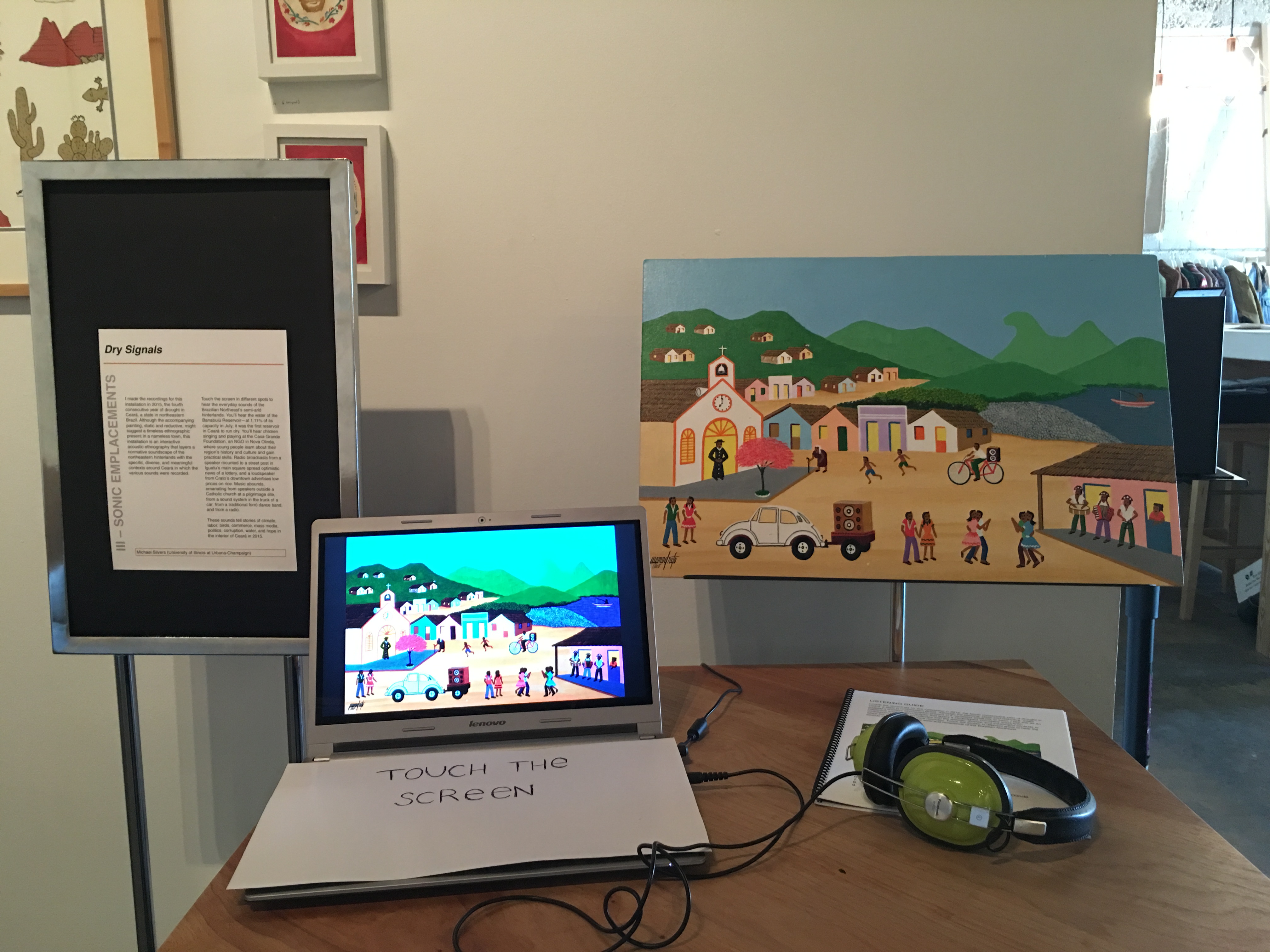 The Dry Signals installation in Austin, 2015: the commissioned painting, a touchscreen laptop, headphones, and the printed listening guide